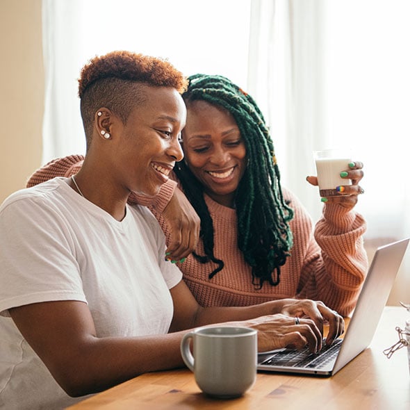 Couple filling out an application for a Home Equity Line of Credit.