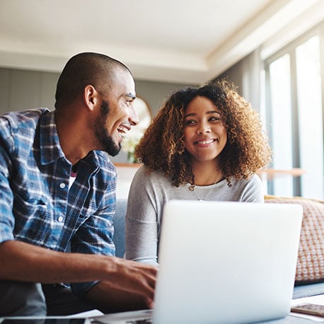 Couple applying for a ITIN loan online with Consolidated Community Credit Union CCCU in Portland Oregon