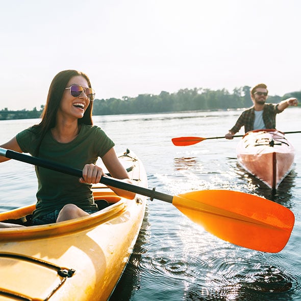 People kayaking who have peace of mind with a personal line of credit from Consolidated Community Credit Union CCCU in portland oregon.
