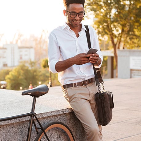 Man using online banking for his Peak Checking account with CCCU credit union in Portland Oregon