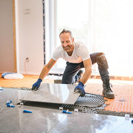 Tile installation at home, funded by a CCCU Home Equity Line of Credit.