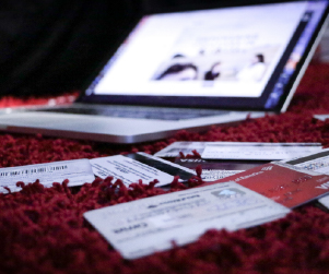 credit cards laid out in from of laptop