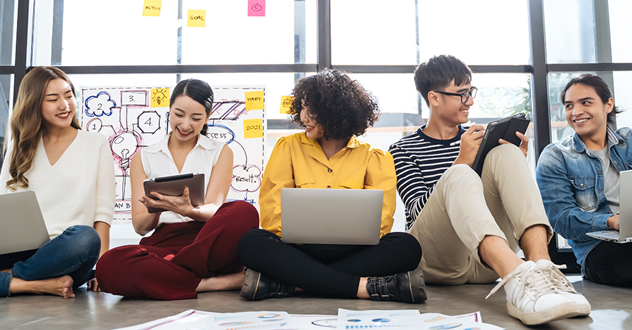 These-college-students-are-smiling-because-they-have-tips-to-keep-their-finances-on-track.